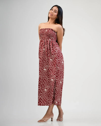 Noirelle sunset-toned maxi dress, strapless tube silhouette, worn by a model
