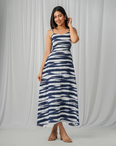 Noirelle maxi dress, sleeveless silhouette, worn by a model