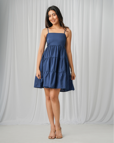Noirelle navy mini dress, sleeveless design, worn by a model