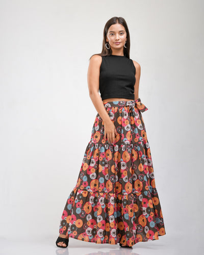 Noirelle skirt, vibrant print, worn by a model