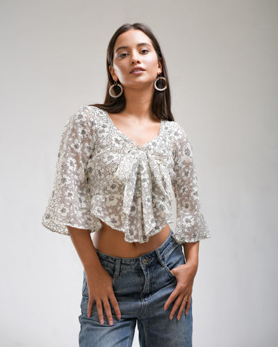Noirelle top, floral print, worn by a model