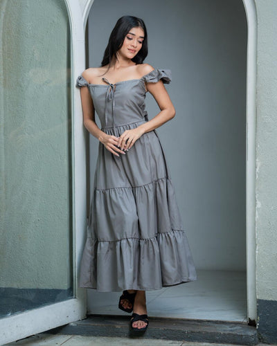 Noirelle light grey maxi dress, tiered silhouette, worn by a model