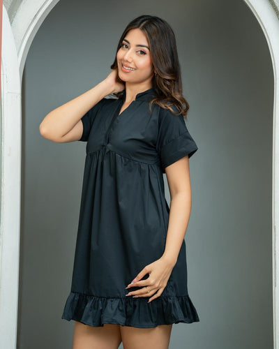 Noirelle black mini dress, ruffle sleeve detail, worn by a model
