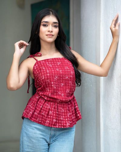 Noirelle ruby-red top, gingham print, worn by a model