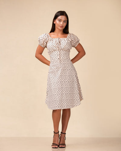 Noirelle mini dress, monochrome floral print, worn by a model