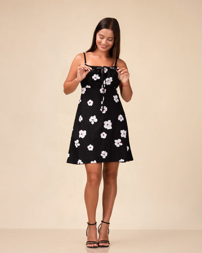 Noirelle black floral-print mini dress, fit-and-flare silhouette, worn by a model