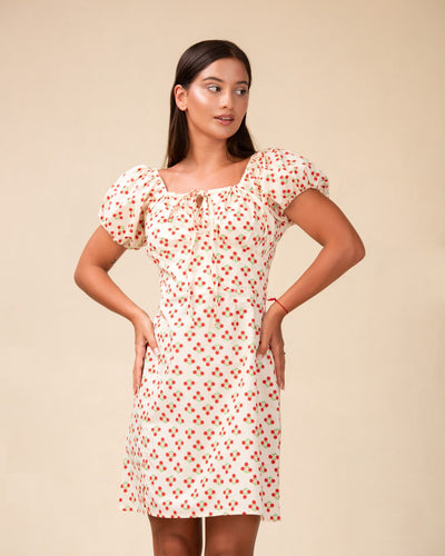 Noirelle mini dress, cherry floral print, worn by a model