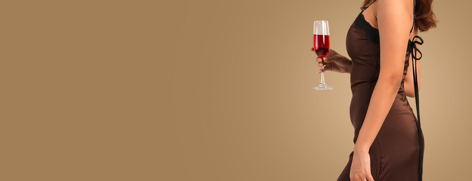Noirelle reveal banner, tan backdrop, desktop crop